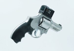 Revolver with dot optic on white background