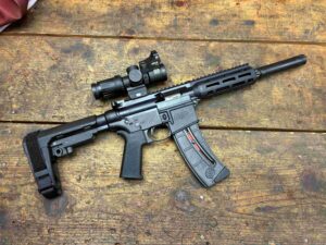 Photo of Smith and Wesson 22 on wood table